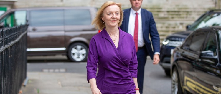 UK prime minister, Liz Truss, walking down a London street