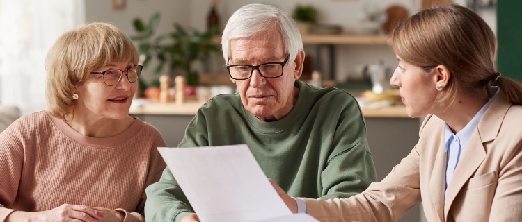 An older couple with a solicitor.