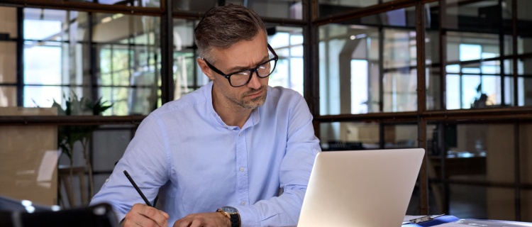 A professional man on his computer.