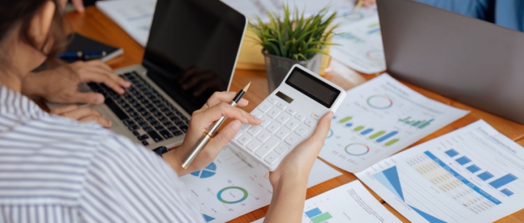 Two people making calculations