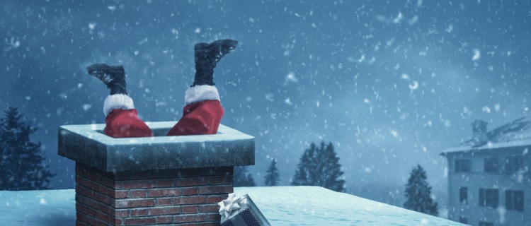 Santa climbing down a chimney
