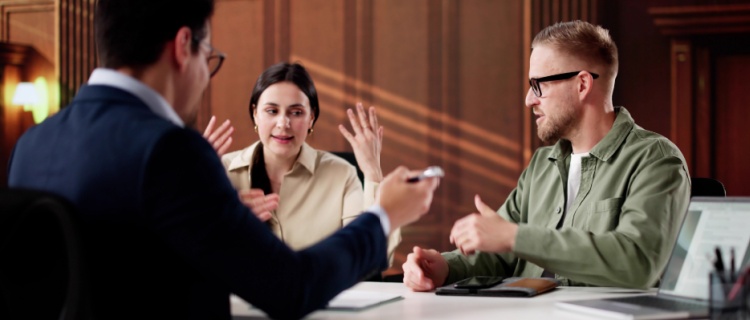 A divorcing couple with a lawyer