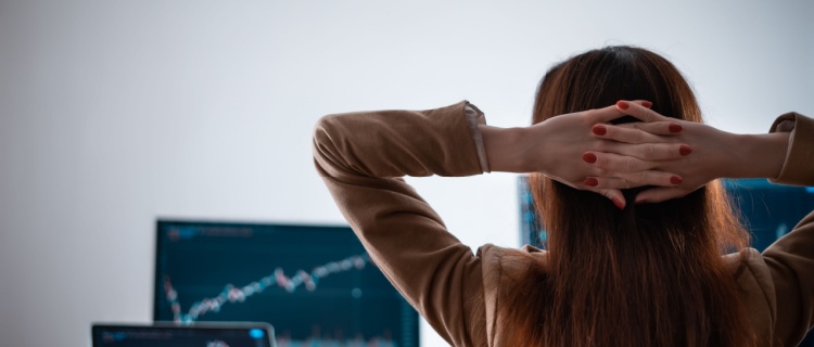 A woman relaxing while looking at markets